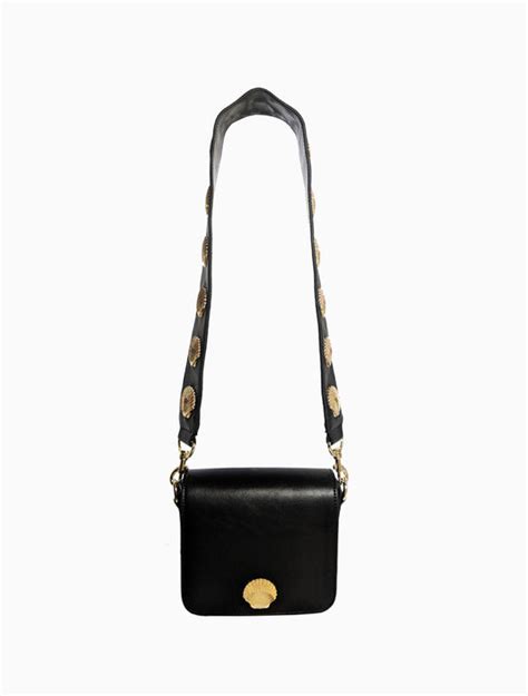 poppy lissiman shell bag dupe|Kmart shoppers in a spin over designer bag dupe: 'Run don't walk'.